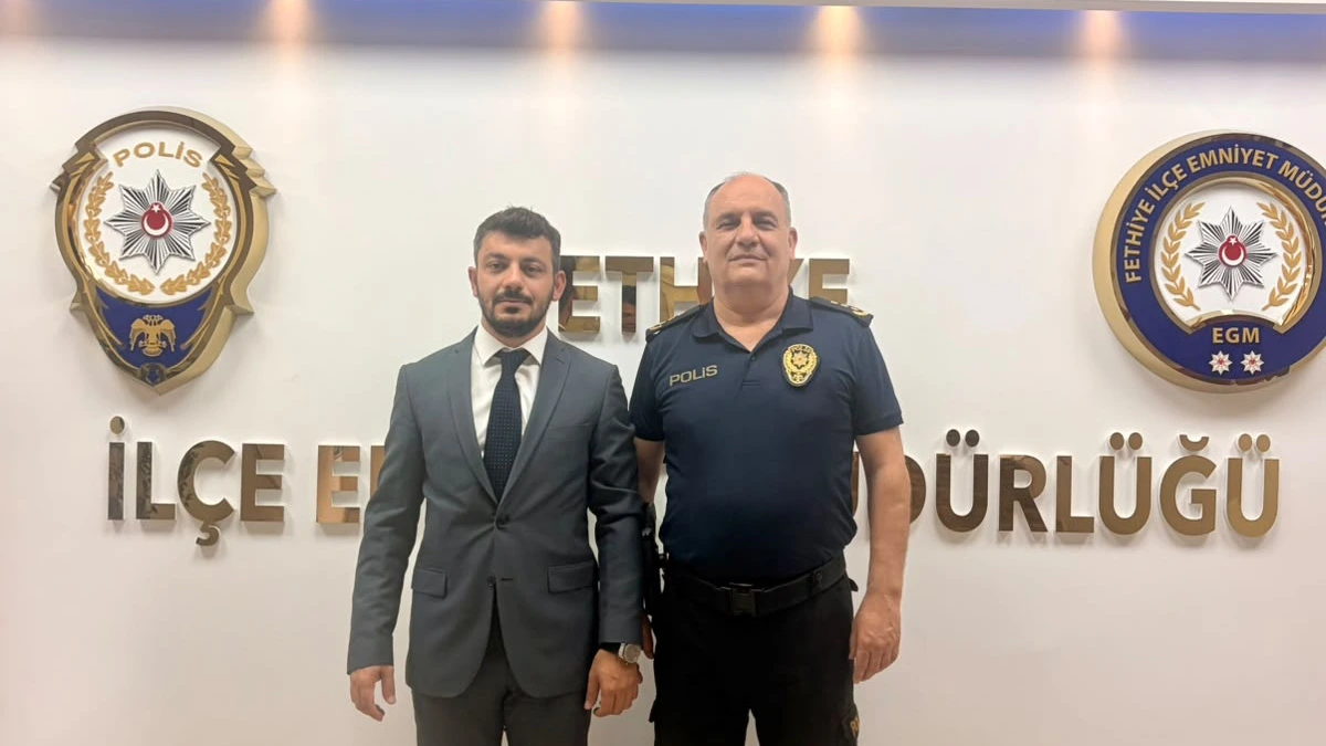 MHP Fethiye İlçe Başkanı Tuğrul Nasuhi Öztürkçü’den İlçe Emniyet Müdürü Muzaffer Yüceur’a Ziyaret